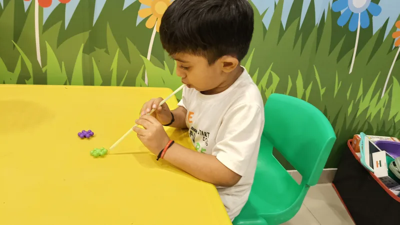 Stammering and fluency therapy for child at Kocoon Junior